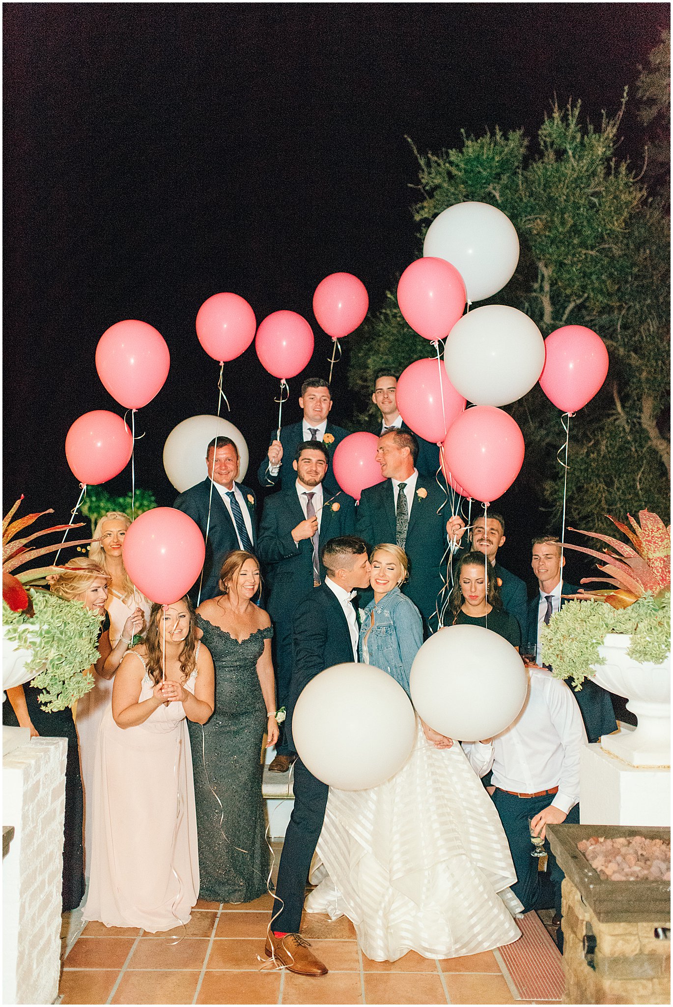 Formal exit on wedding day with balloons